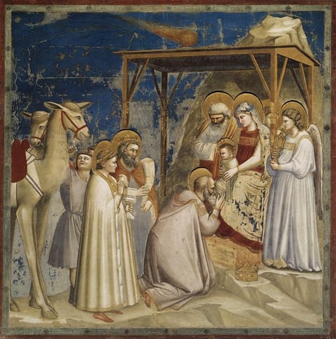 Giotto’s Adoration of the Magi in the Scrovegni Chapel, with a bright comet above the shelter.