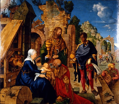 Albrecht Dürer’s 1504 Adoration of the Magi, with three richly dressed kings offering gifts to Mary and Jesus among architectural ruins.