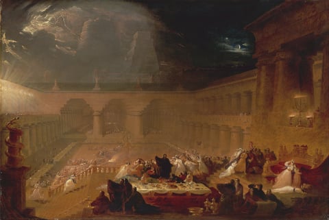 A banquet erupts in alarm beneath glowing writing in the immense palace of Belshazzar.