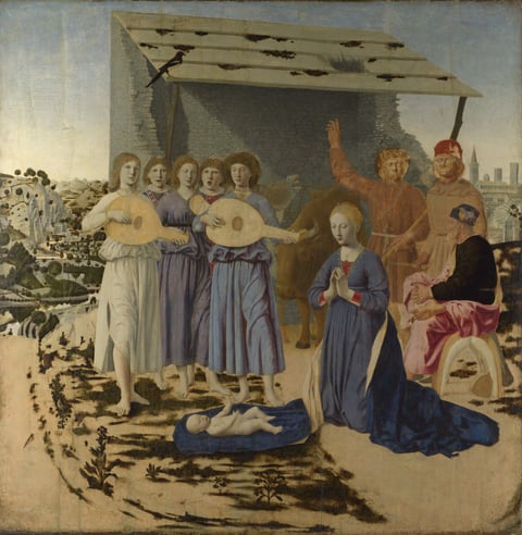 Piero della Francesca’s The Nativity: five angels, two playing lutes and two singing, stand beside Mary as she kneels before the baby lying on her cloak, with an ox, a donkey and two shepherds behind.