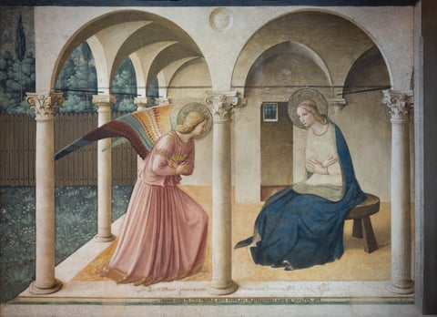 Fra Angelico’s San Marco Annunciation, with Gabriel and Mary facing one another under a pale arcade beside a garden.