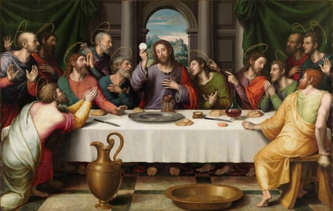 The Last Supper by Juan de Juanes (about 1562): the fifth Luminous Mystery of the Rosary, with Jesus holding up the bread among the twelve apostles.