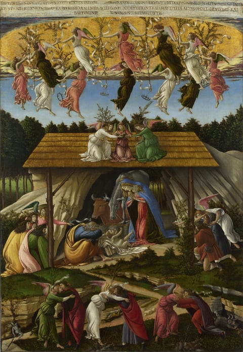 Sandro Botticelli’s Mystic Nativity: a ring of dancing angels above a thatched shelter, with Mary kneeling before the baby and small devils fleeing at the bottom.