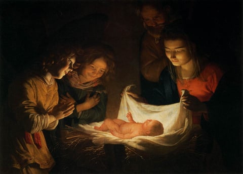 Gerard van Honthorst’s Adoration of the Child: light from the baby in the manger falls on Mary, an old Joseph and two smiling angels.